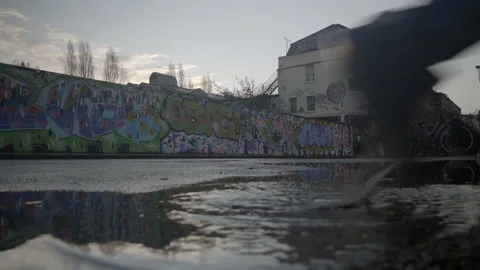 Puddle step in puddle truman Stock Footage 145560939