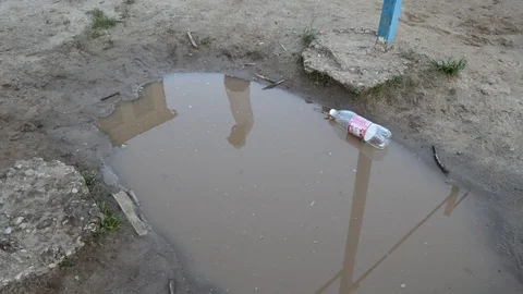 Puddle under a horizontal bar Stock Footage 101666071