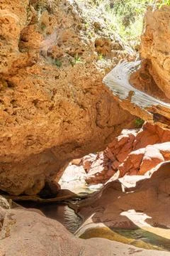 A puddle of water in the desert Stock Photos
