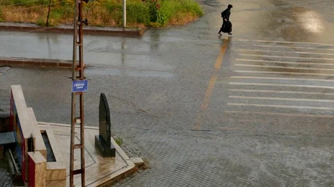 Puddles formed in the road when it rained, a city in the rain Stock Footage 110824290
