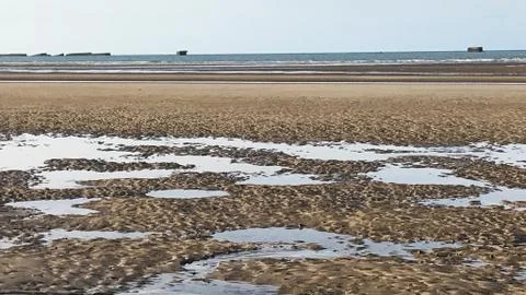 Puddles in the sand Stock Photos
