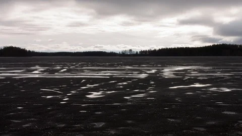 Puddles on wet ice time-lapse Stock Footage 97979720