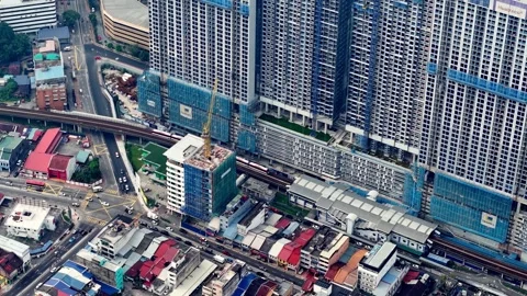 Pudu view with a LRT train crossing over a bridge Video stock 318272932