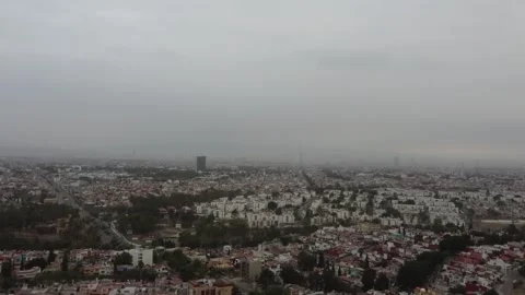 Puebla under a cloud of ash caused by eruptions of the Popocatéptl volcano Stock Footage 241730108