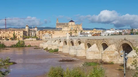 Puente Romano bridge and Mosque-Cathedral of Cordoba Stock Footage 70603744