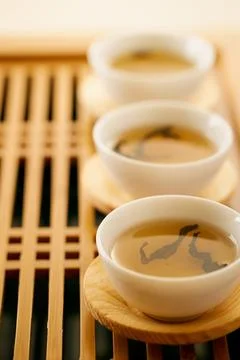 Puer tea in a traditional teacup Stock Photos