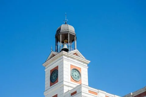 The Puerta del Sol (Gate of the Sun) is public square in Madrid Stock Photos