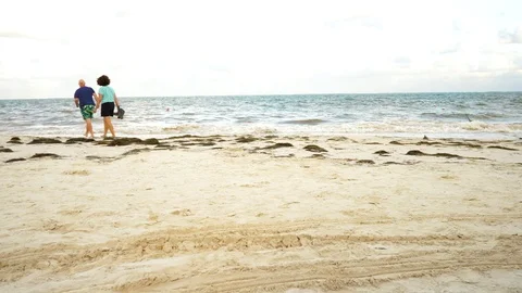 Puerto morelos beach two older adults afternoon 動画素材 120660580