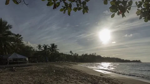 Puerto Rico: Beach with Clouds, Trees, and Party, Sunset, Day to Night Stock Footage 77584484