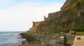 Puerto Rico - El Morro Oceanfront Sidewalk and Cat Haven v2 HD Footage