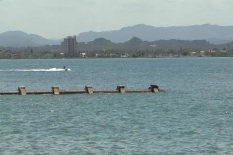 Puerto Rico - fun next to sewage pipe with Jet Ski Stock Footage