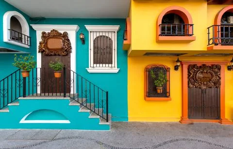 Puerto Vallarta colorful streets in historic city center near the sea promena Stock Photos