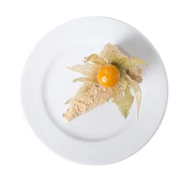 Puff cake with walnuts and physalis. Stock Photos