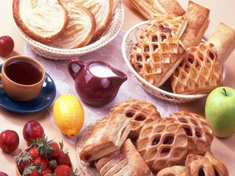 Puff with cherry filling Stock Photos