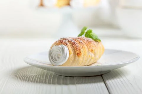 Puff cone with cream. Stock Photos