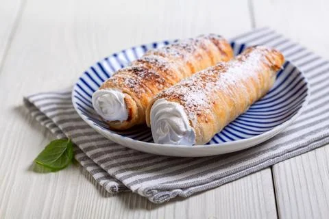 Puff cones with cream. Stock Photos