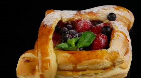 Puff pastry with berries rotating (loop) Stock Footage 55641692