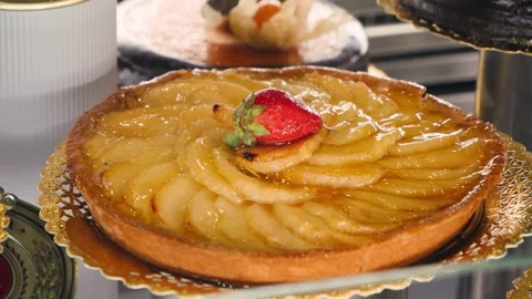 Puff pastry cake with apples on the counter of a bakery. Stock Footage 317551177