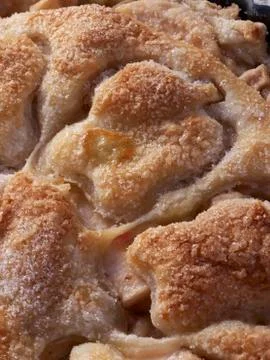 A puff pastry covered lightly sugared apple tart Stock Photos
