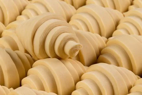 Puff pastry croissants ready to bake. Stock Photos