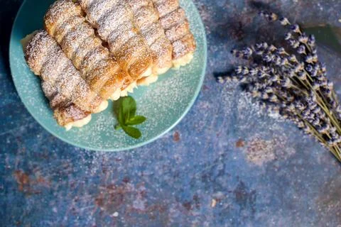 Puff pastry tubes filled with custard 스톡 사진