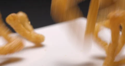 Puffed chips with paprika flavor falling slow motion Stock Footage 280520077