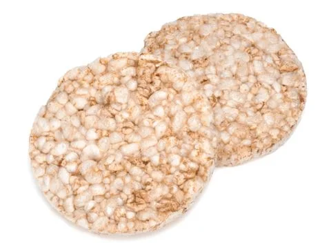 Puffed rice bread isolated on white background, diet crispy round rice waffles Stock Photos