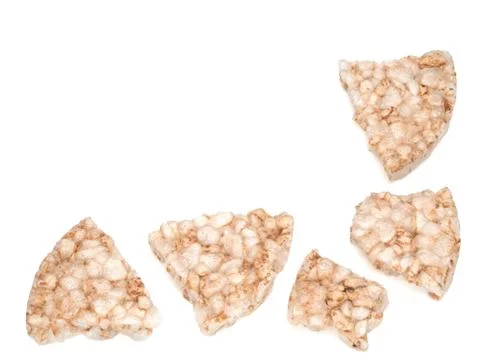 Puffed rice bread isolated on white background, pieces of diet crispy round rice Foto stock