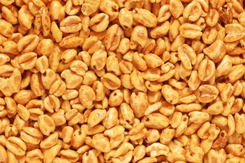 Puffed wheat background Stock Photos
