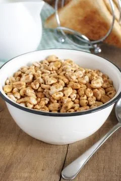 Puffed wheat cereal Stock Photos