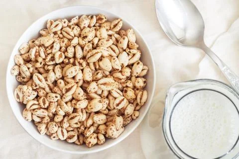 Puffed wheat cereal Stock Photos