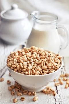 Puffed wheat cereal Stock Photos