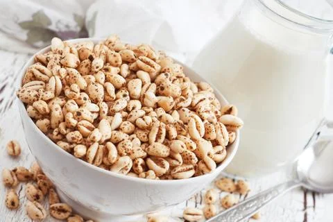 Puffed wheat cereal Stock Photos