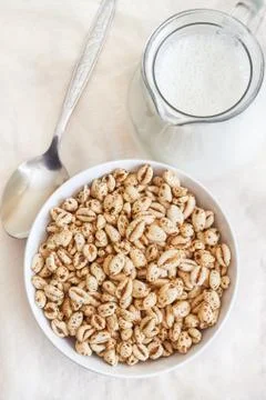 Puffed wheat cereal Stock Photos