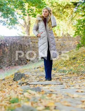 Puffer fashion trend concept. Oversized jacket trend. Puffer jacket casual and Stock Photos