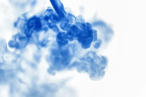Puffs of paint in water. The dissolution of the dye in water. Water polluti.. Stock Photos