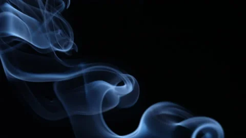 Puffs of smoke on a black background. Close-up Vidéo 234900105