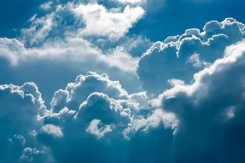 Puffy cloud on blue sky view Stock Photos