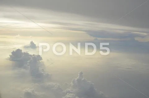 Puffy Clouds from Above Stock Photos