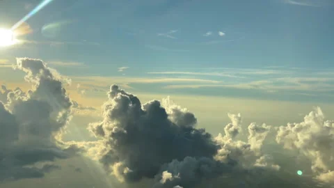 Puffy Clouds From Above - Sun Breaking Through Видео 202052477