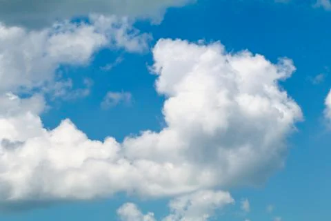 Puffy Clouds in an Azure Sky Stock Photos