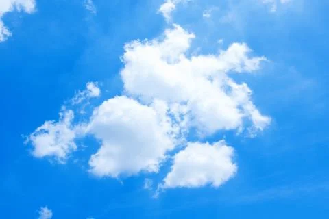 Puffy Clouds background in the sky Stock Photos