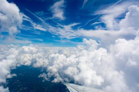 Puffy Clouds on Blue Sky Background Stockfoto's