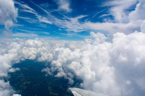 Puffy Clouds on Blue Sky Background Stock Photos