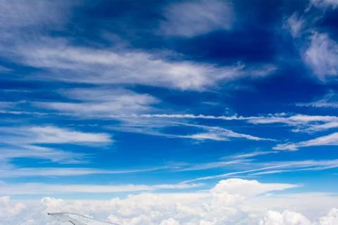 Puffy Clouds on Blue Sky Background Stock Photos