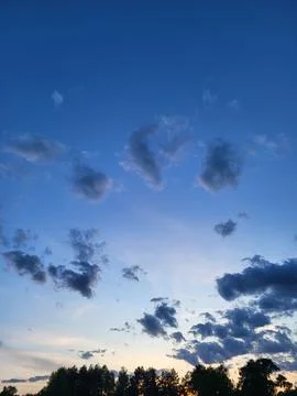 Puffy Clouds on Deep Blue Sky Stock Photos