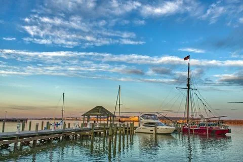 Puffy Clouds &amp; Docked Boats Stock Photos