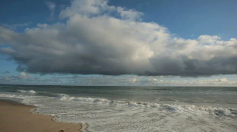 Puffy Clouds over Ocean Timelapse Stock Footage 447429