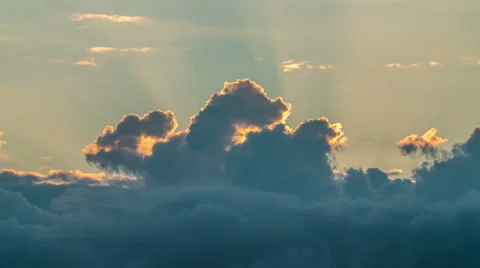 The puffy clouds with rays of sunlight at the edge, close up view Stock-Footage 52376653