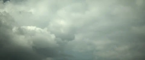 Puffy clouds in the sky cinemascope Stock-Footage 242792773